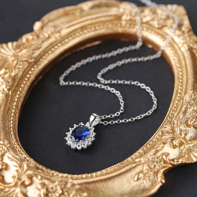 Collar de Plata 925 con Zafiro Azul Ovalado y Halo de Cristales